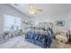 Relaxing bedroom with a metal bed frame and a ceiling fan at 24191 N Desert Dr, Florence, AZ 85132