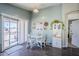 Bright kitchen with a dining area and access to the backyard at 24191 N Desert Dr, Florence, AZ 85132