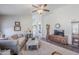 Living room with hardwood floors, and a view into other rooms at 24191 N Desert Dr, Florence, AZ 85132