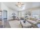 Spacious living room featuring hardwood floors and ample natural light at 24191 N Desert Dr, Florence, AZ 85132