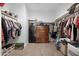 Spacious walk-in closet with ample shelving and hanging space at 2530 W Sable Ave, Apache Junction, AZ 85120