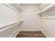 Large closet with double hanging rods and shelving at 2571 N Miller Rd, Scottsdale, AZ 85257