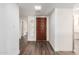 Light and bright entryway with wood flooring at 2571 N Miller Rd, Scottsdale, AZ 85257