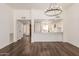 Modern kitchen with breakfast bar and white cabinets at 2571 N Miller Rd, Scottsdale, AZ 85257