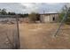 Large backyard with shed and chain link fence at 2613 E Lynne Ln, Phoenix, AZ 85042