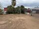 Large backyard with old swing set at 2613 E Lynne Ln, Phoenix, AZ 85042