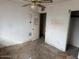 Needs renovation. Features a ceiling fan and closet at 2613 E Lynne Ln, Phoenix, AZ 85042