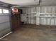 Garage with shelving and overhead storage at 2613 E Lynne Ln, Phoenix, AZ 85042