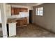 Kitchen with wood cabinets and tile flooring at 2613 E Lynne Ln, Phoenix, AZ 85042