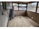 Small screened porch with water heater at 2613 E Lynne Ln, Phoenix, AZ 85042