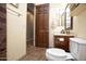 Bathroom with toilet and vanity; adjacent to bedroom at 26293 W Sierra Pinta Dr, Buckeye, AZ 85396