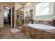 Spa-like bathroom featuring a large soaking tub and walk-in shower at 26293 W Sierra Pinta Dr, Buckeye, AZ 85396