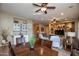 Bright dining area with built-in bar and views into the living room at 26293 W Sierra Pinta Dr, Buckeye, AZ 85396