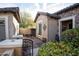 Charming front courtyard with sitting area and lush landscaping at 26293 W Sierra Pinta Dr, Buckeye, AZ 85396