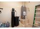 Garage with water heater, water softener and storage at 26293 W Sierra Pinta Dr, Buckeye, AZ 85396