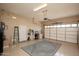 Spacious garage with overhead storage and epoxy flooring at 26293 W Sierra Pinta Dr, Buckeye, AZ 85396