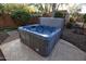 Private hot tub nestled in a landscaped backyard oasis at 26293 W Sierra Pinta Dr, Buckeye, AZ 85396