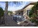 Private hot tub with steps, nestled in a gravel backyard at 26293 W Sierra Pinta Dr, Buckeye, AZ 85396