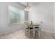 Bright dining area features a charming wooden table with four chairs at 2702 S Joplin --, Mesa, AZ 85209