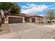 Front view of house with two-car garage and landscaping at 2702 S Joplin --, Mesa, AZ 85209