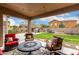 Covered patio with seating area and view of backyard at 2702 S Joplin --, Mesa, AZ 85209