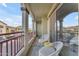 Spacious balcony with two chairs and a view of the community at 2725 E Mine Creek Rd # 2054, Phoenix, AZ 85024