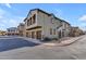 Tan three-story townhome with two-car garage and balcony at 2725 E Mine Creek Rd # 2054, Phoenix, AZ 85024