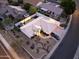 Aerial view of single-story house with desert landscaping and a truck in the driveway at 2741 E Claire Dr, Phoenix, AZ 85032