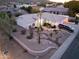 Aerial view of a single-story house with a landscaped yard and a truck parked in the driveway at 2741 E Claire Dr, Phoenix, AZ 85032