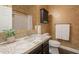 Bathroom with granite countertop, single sink and toilet at 2741 E Claire Dr, Phoenix, AZ 85032