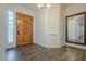 Bright entryway with wood floors and a large mirror at 2741 E Claire Dr, Phoenix, AZ 85032