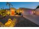 Two-story house with three-car garage and desert landscaping at 2741 E Claire Dr, Phoenix, AZ 85032