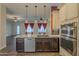 Modern kitchen with stainless steel appliances and granite countertops at 2741 E Claire Dr, Phoenix, AZ 85032