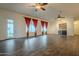 Spacious living room with hardwood floors and access to backyard at 2741 E Claire Dr, Phoenix, AZ 85032