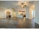 Open living room with hardwood floors, high ceilings and a wet bar at 2741 E Claire Dr, Phoenix, AZ 85032