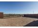 Large, flat backyard with block wall and mountain views at 2811 N 212Th Dr, Buckeye, AZ 85396