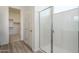 Bathroom with a walk-in shower and plenty of light at 2811 N 212Th Dr, Buckeye, AZ 85396