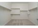 Large walk-in closet with double hanging rods at 2811 N 212Th Dr, Buckeye, AZ 85396