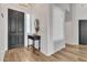 Bright entryway with dark wood flooring and a console table at 3020 E Lark Dr, Chandler, AZ 85286