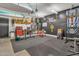 Home gym with weightlifting equipment and storage at 3020 E Lark Dr, Chandler, AZ 85286