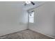 Bedroom with carpet flooring, window with blind and baseboard trim at 30263 W Pinchot Ave, Buckeye, AZ 85396