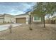 Charming single-story home with a two-car garage and low maintenance desert landscaping at 30263 W Pinchot Ave, Buckeye, AZ 85396