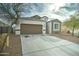 Charming single-story home with a two-car garage and low maintenance desert landscaping at 30263 W Pinchot Ave, Buckeye, AZ 85396