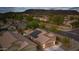 Aerial view of a charming single Gathering home featuring a private backyard pool and roof-mounted solar panels at 3102 W Louise Dr, Phoenix, AZ 85027