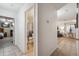 Hallway with tile floors leading to bedrooms, living area, and bathroom at 3102 W Louise Dr, Phoenix, AZ 85027