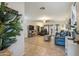 Spacious living room featuring tile flooring, comfortable seating, and ample natural light, creating an inviting atmosphere at 3102 W Louise Dr, Phoenix, AZ 85027