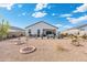 Spacious backyard with patio and desert landscaping at 3560 N Mia Ln, Casa Grande, AZ 85122