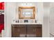 Double vanity bathroom with a large framed mirror at 3560 N Mia Ln, Casa Grande, AZ 85122