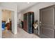 Entryway with dark brown door and display cabinet at 3560 N Mia Ln, Casa Grande, AZ 85122