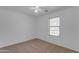 Simple bedroom with neutral walls and carpeting at 40440 N High Meadows Dr, San Tan Valley, AZ 85140